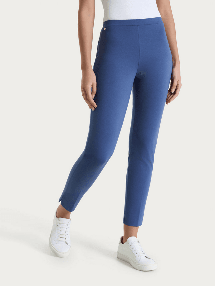 woman ocean trousers