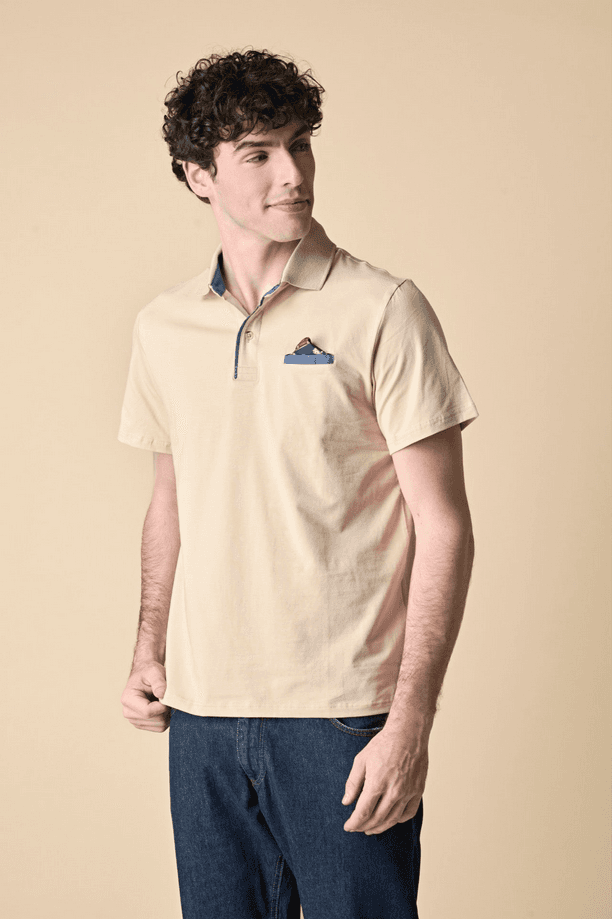 polo with bark man sand