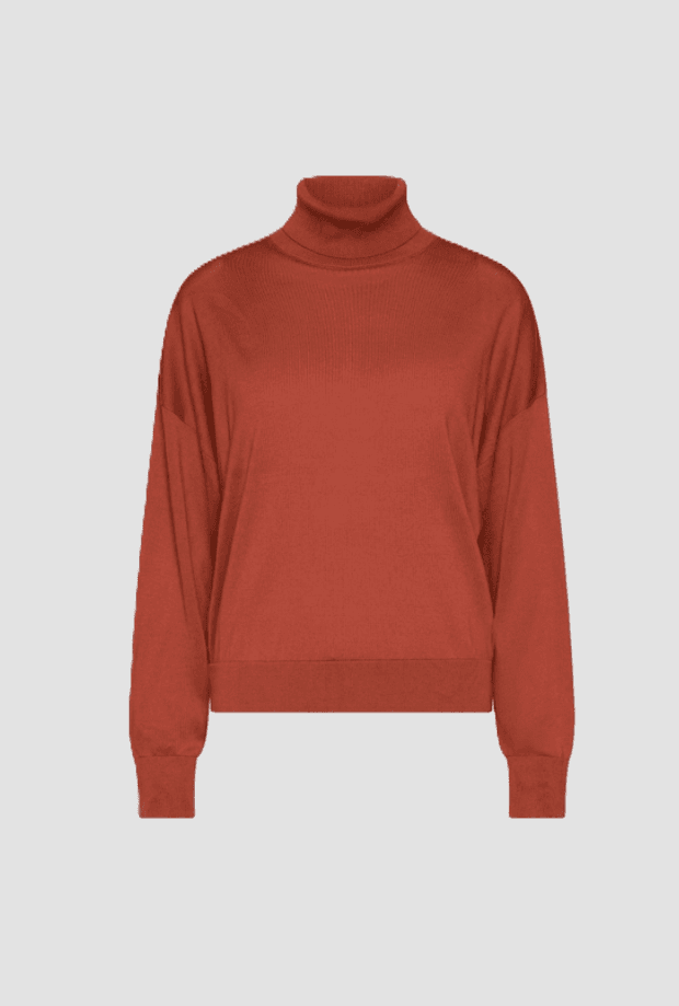 turtleneck woman rust