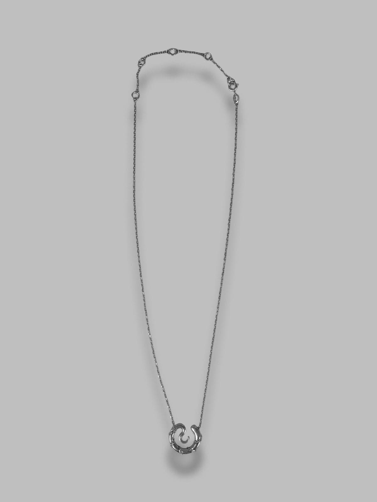 serpent medallion necklace