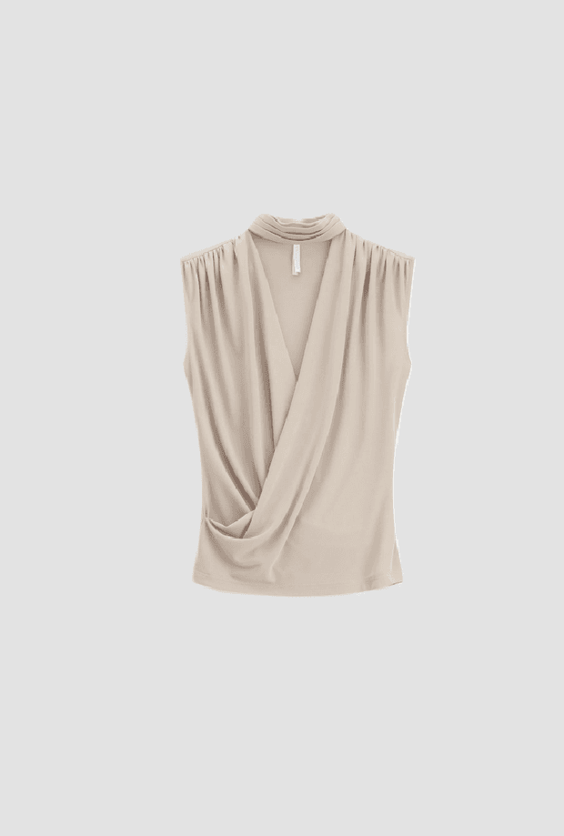 top crossed woman sand